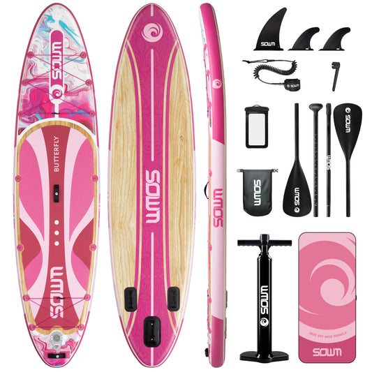 Pink and white SOUL paddle board with accessories on a white background
