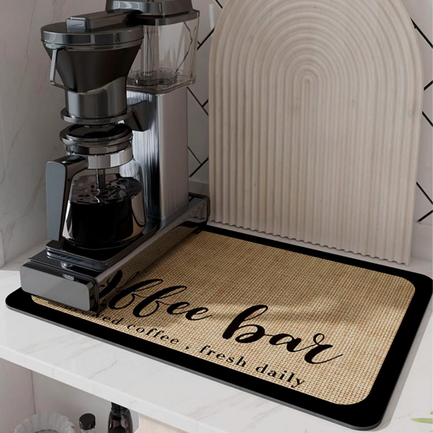 Coffee bar mat with a coffee grinder on a kitchen counter