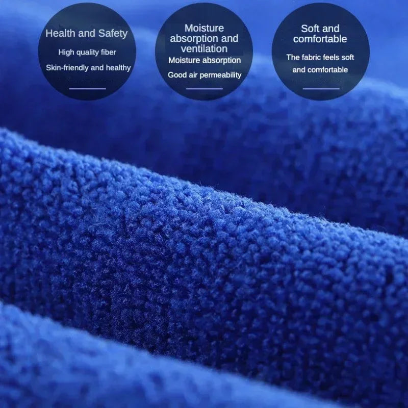 Close-up of blue fabric with health and safety, moisture absorption, and comfort text labels.
