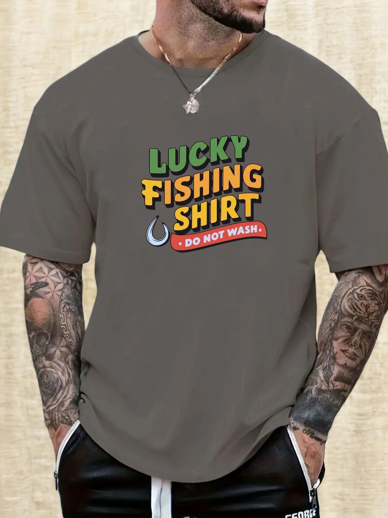 Person wearing a gray t-shirt with 'Lucky Fishing Shirt Do Not Wash' text design.