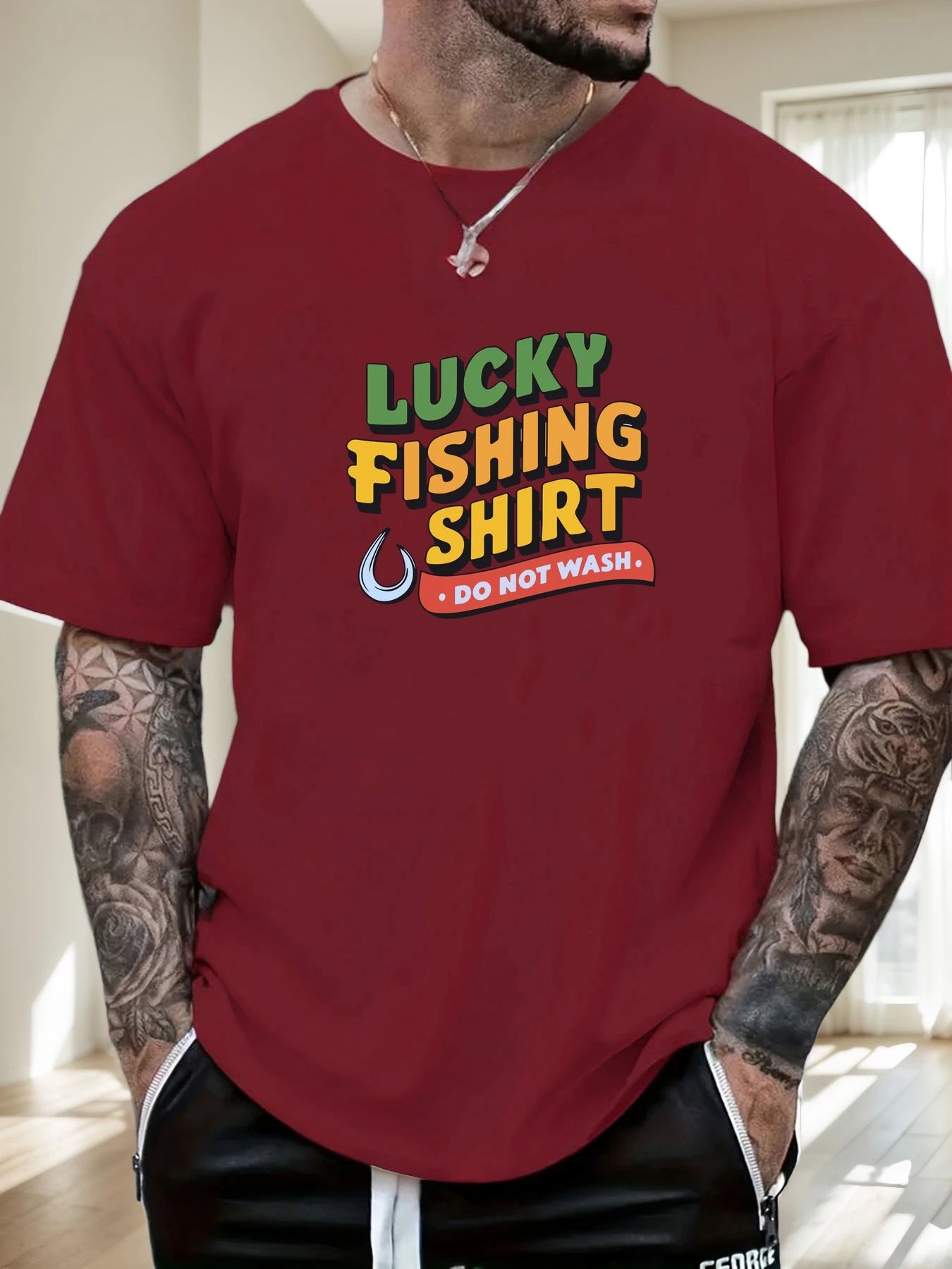 Person wearing a red t-shirt with 'Lucky Fishing Shirt Do Not Wash' text.