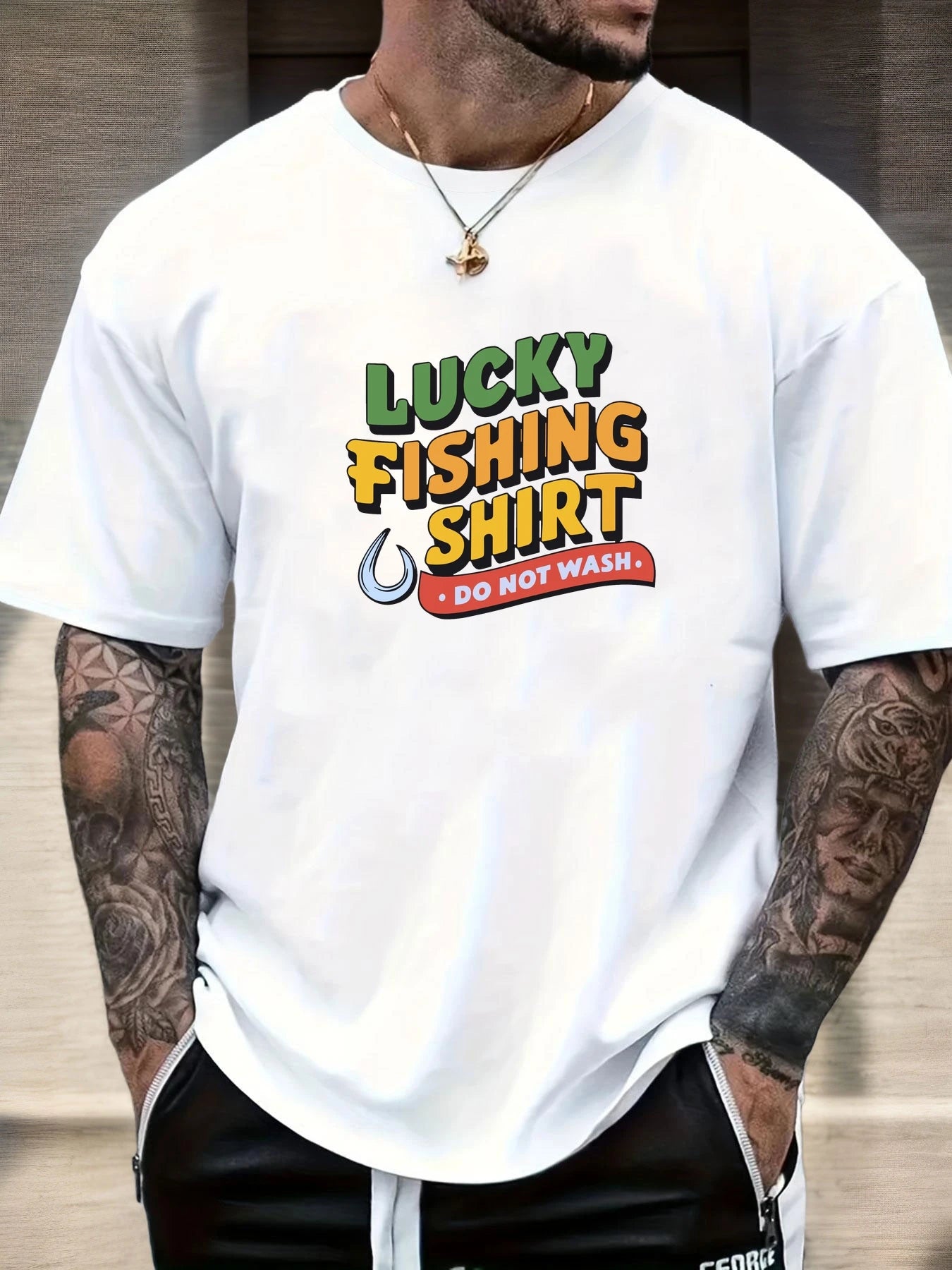 Person wearing a white t-shirt with 'Lucky Fishing Shirt Do Not Wash' text and graphics.