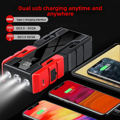Portable power bank with dual USB charging capability and flashlight feature, displayed with smartphones.