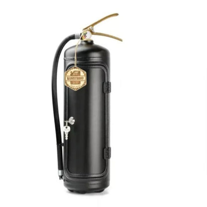 Black vintage-style fire extinguisher with a gold tag on a white background