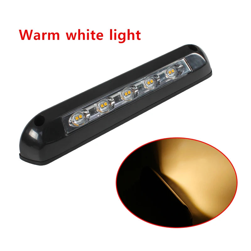 LED light bar with warm white light text and close-up of gold surface.