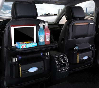 Car backseat organizer with tablet, drinks, and snacks in a vehicle interior.