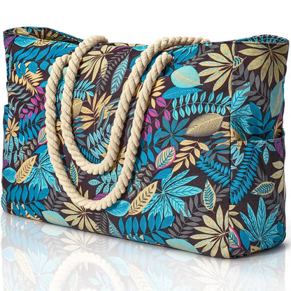 Tropical leaf patterned bag with rope handles on a white background