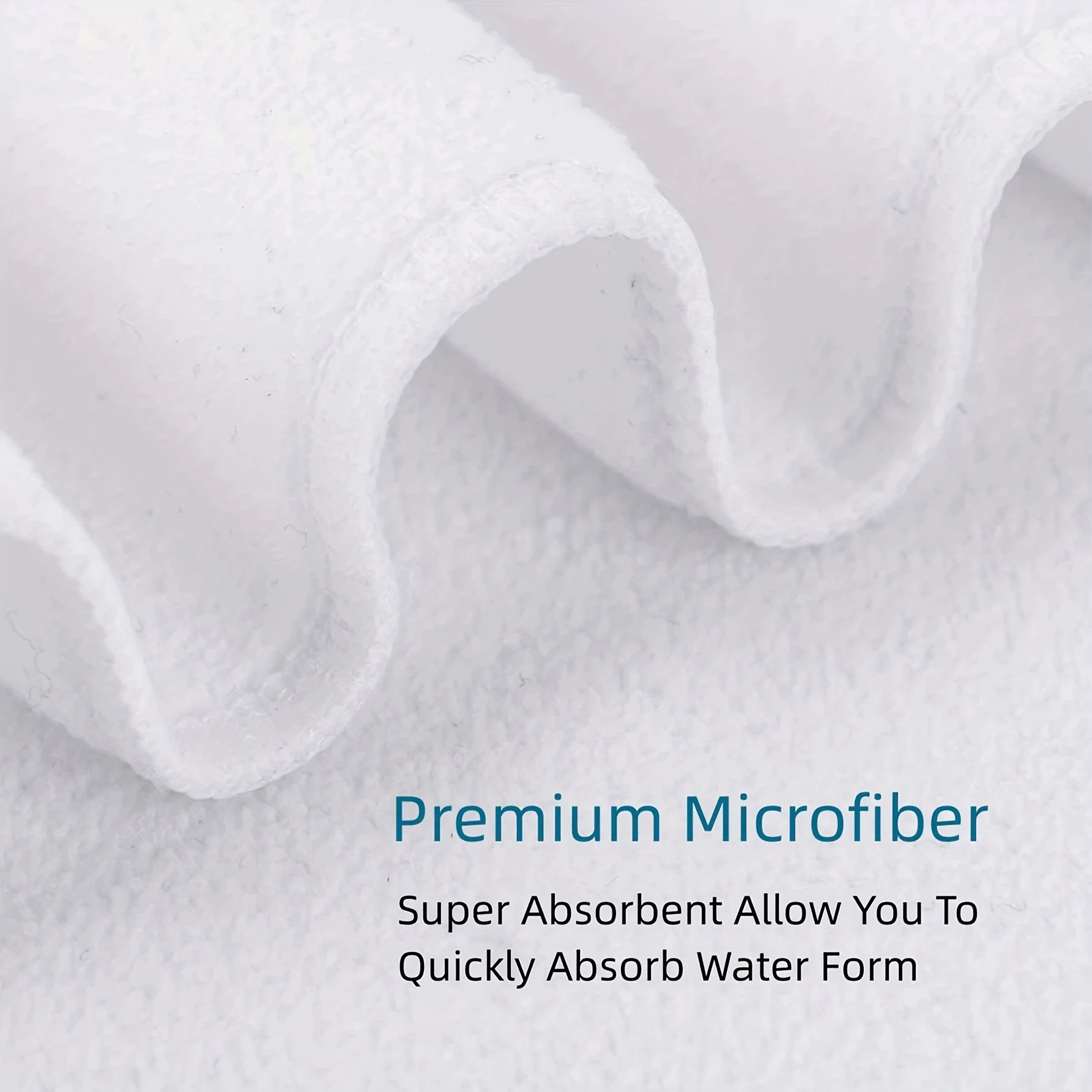 Close-up of premium microfiber fabric with text highlighting absorbency.