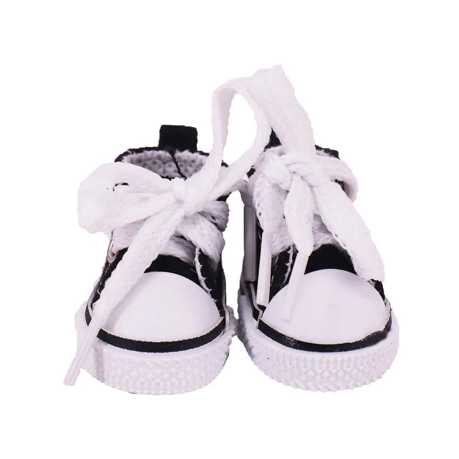 Pair of black and white shoes on a white background