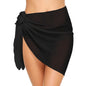 Black wrap skirt worn by a person on a white background