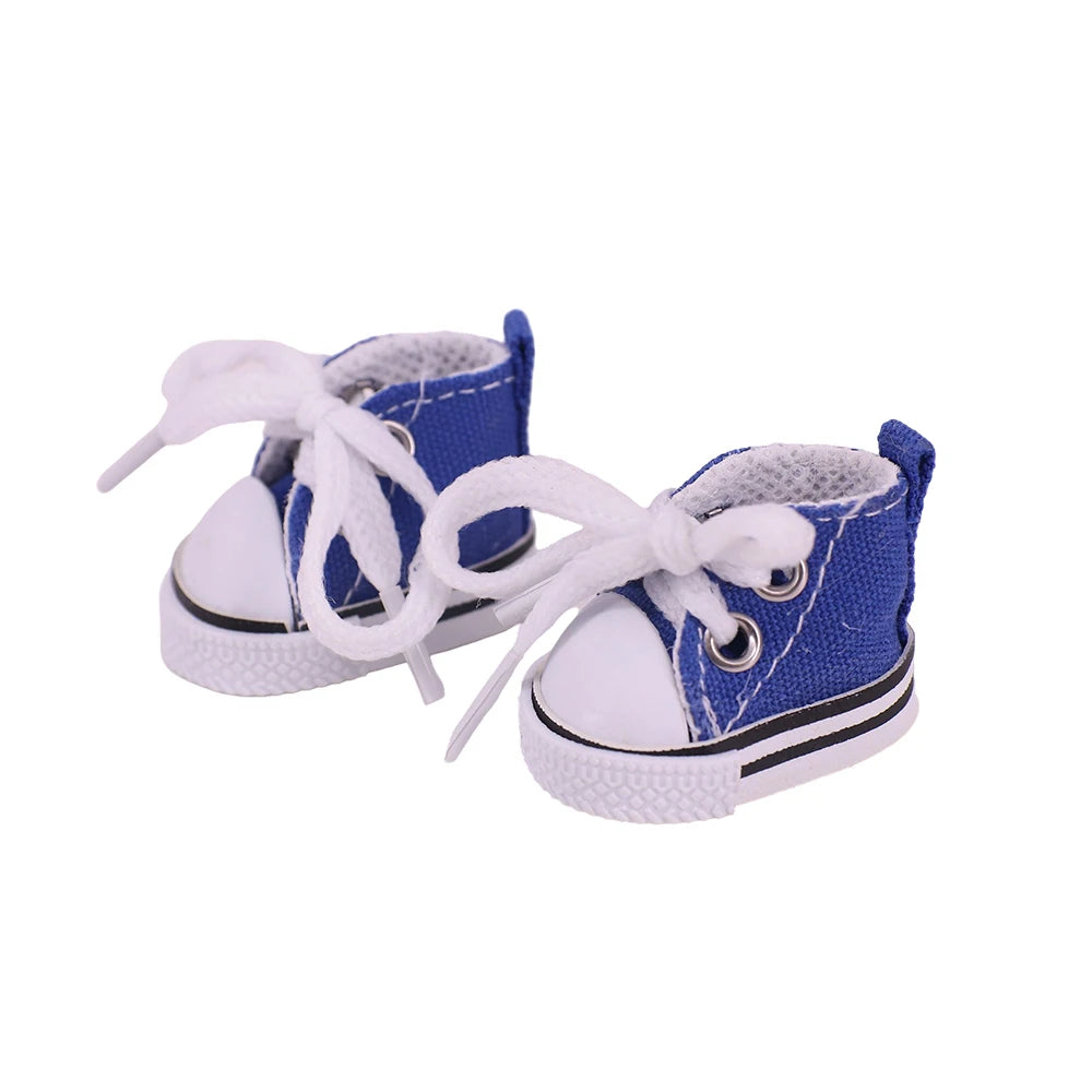 Pair of blue and white sneakers on a white background