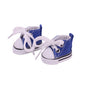 Pair of blue and white sneakers on a white background