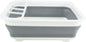 Collapsible gray and white dish rack on a white background