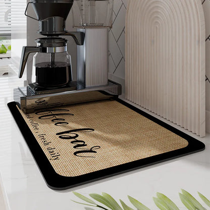 Doormat with 'Coffee lover' text in a kitchen setting