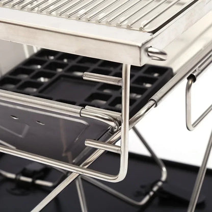 Close-up of a metal grill with a black grid on a white background