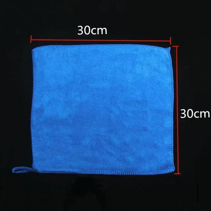 Blue towel with dimensions labeled on a black background