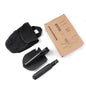 Black folding shovel, black pouch, and cardboard box on a white background