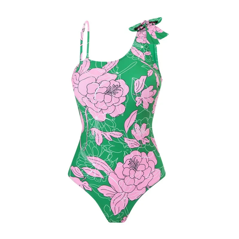 Green and pink floral one-piece swimsuit on a white background