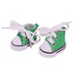 Green high-top sneakers with white laces on a white background