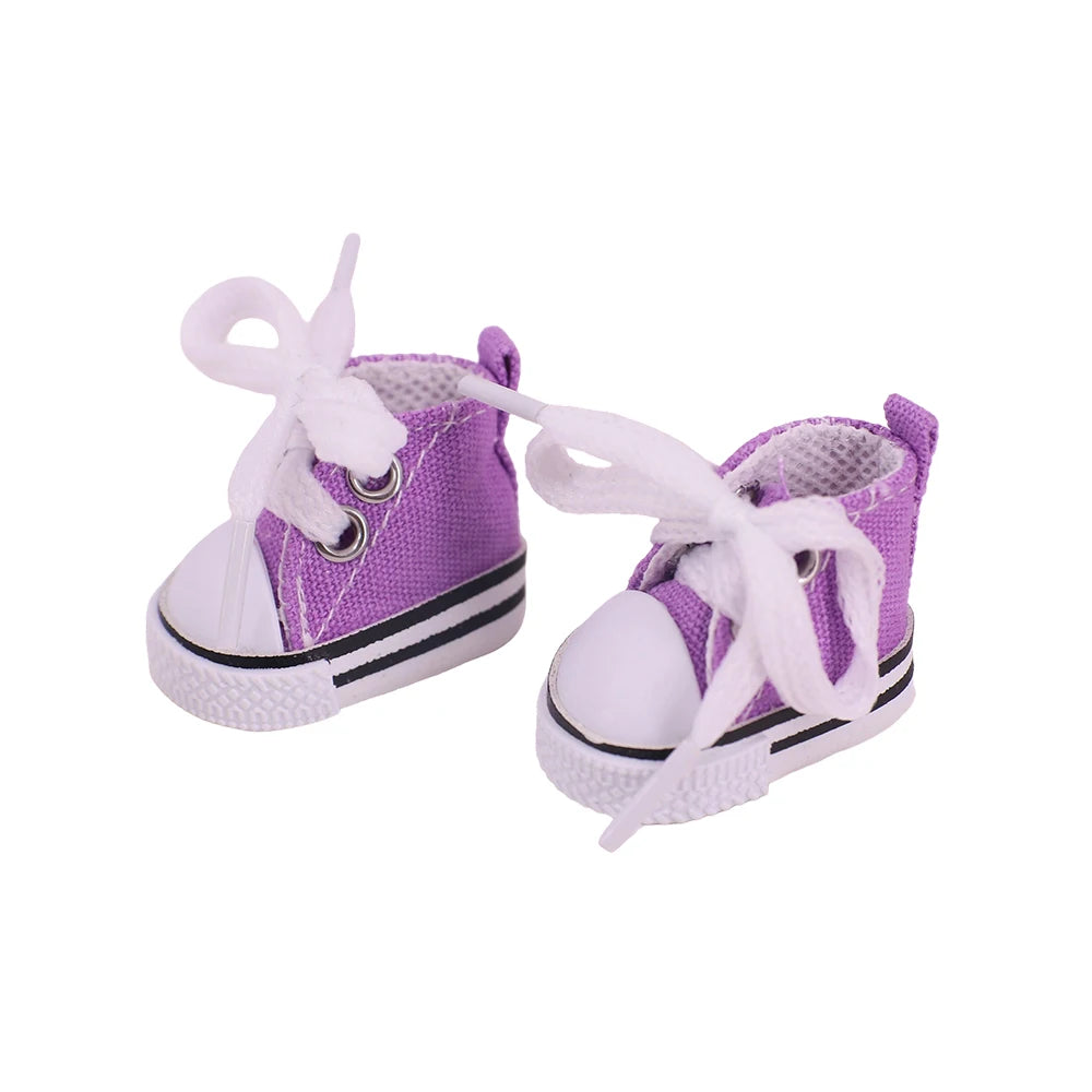 Purple sneakers with white laces on a white background