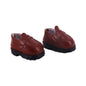 Pair of red shoes with black soles on a white background