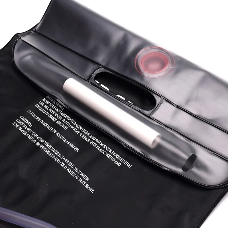 Black hair straightener with a metallic finish on a white background