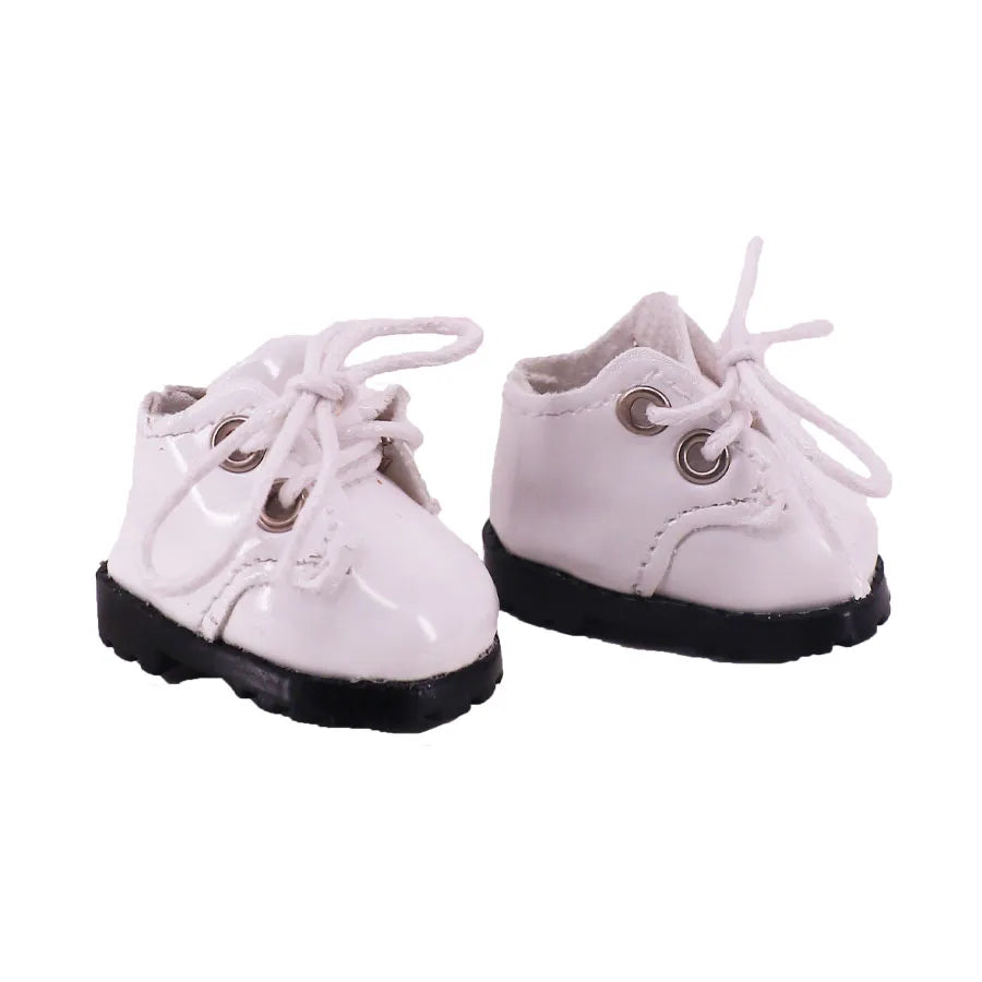 White shoes with black soles on a white background