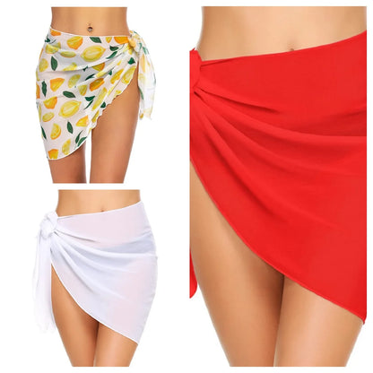 Four different colored sarongs displayed on a white background